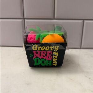 Schylling Groovy NeeDoh Fruit Stress Toy Pack - Orange & Pink